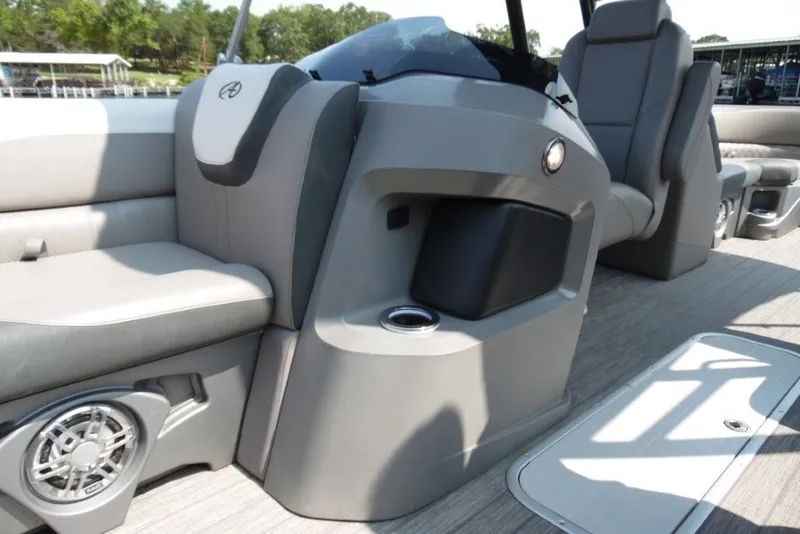 Slide: The Image of 2021 Avalon LSZ Quad Lounge boat interior with seating and speaker system. - 16
