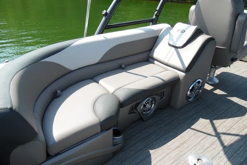 Slide: The Image of 2021 Avalon LSZ Quad Lounge 24' boat interior with plush seating and modern design. - 23