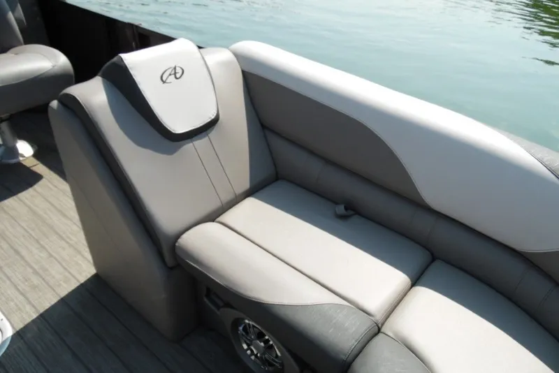 Slide: The Image of Luxurious seating on 2021 Avalon LSZ Quad Lounge pontoon boat, featuring elegant gray upholstery. - 14