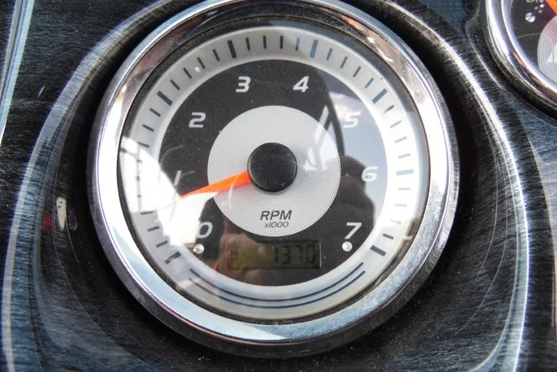 Slide: The Image of Tachometer of 2021 Avalon LSZ Quad Lounge boat, displaying RPM readings. - 20