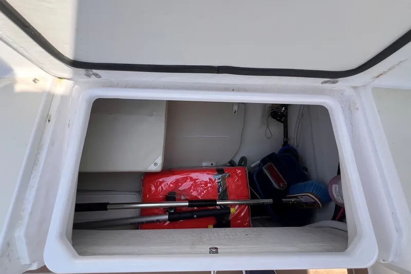 Slide: The Image of Storage compartment of 2023 J Boats J/9 sailboat with equipment and supplies. - 20