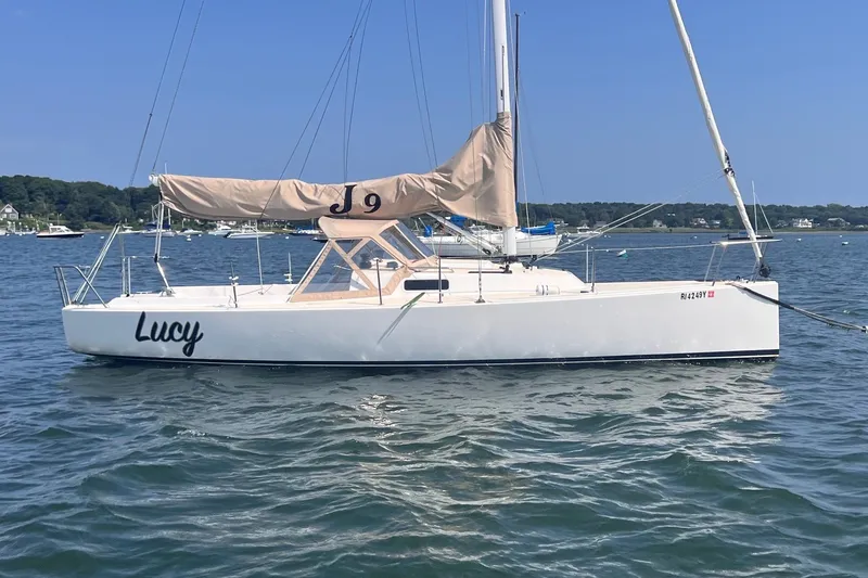 The Image of 2023 J Boats J/9 sailboat named Lucy on calm water. - 0
