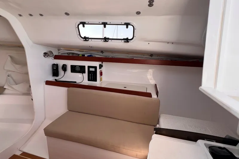 Slide: The Image of Interior of 2023 J Boats J/9 sailboat with seating and navigation equipment. - 31