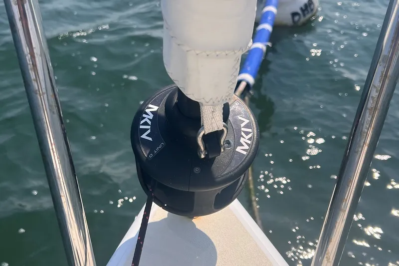 Slide: The Image of Close-up of a 2023 J Boats J/9 sailboat's furling system on the water. - 10