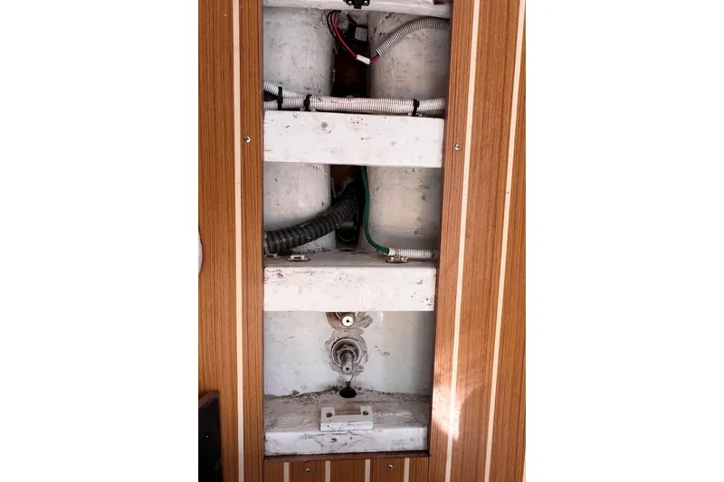Slide: The Image of Interior view of 2023 J Boats J/9 sailboat showing plumbing and wiring. - 40