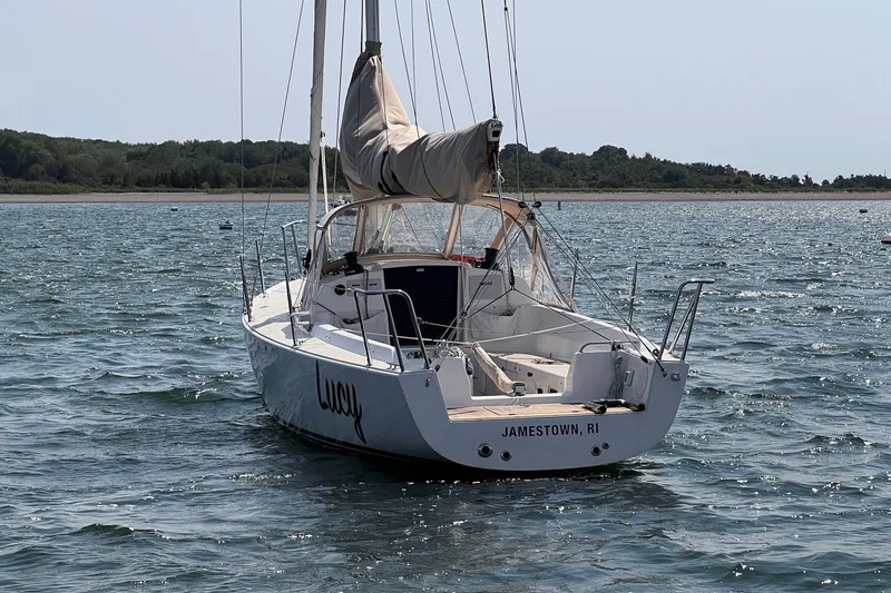 Slide: The Image of 2023 J Boats J/9 sailboat anchored in scenic waters near Jamestown, RI. - 5