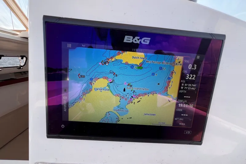 Slide: The Image of B&G navigation display on 2023 J Boats J/9, showing nautical chart and coordinates. - 27