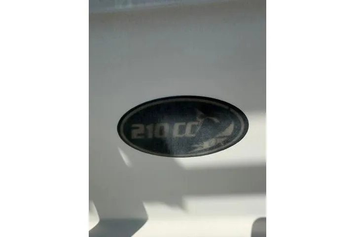 Slide: The Image of KenCraft 210 Sea King 2007 boat emblem, displaying "210 CC" in an oval design. - 16