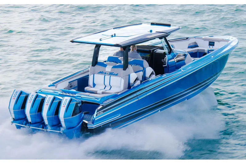 The Image of Manufacturer Provided Image: 2026 Nor-Tech 42 Eleven speedboat with quad engines cruising on water. - 0