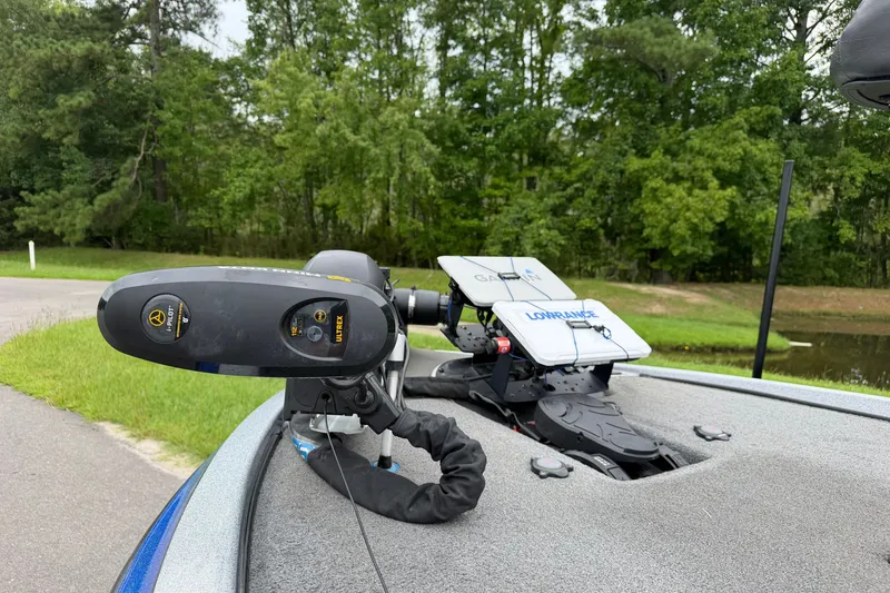 Slide: The Image of Boat deck with Garmin and Lowrance equipment, featuring a 2022 Falcon F20 model. - 10