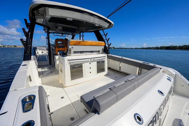Slide: The Image of 2024 Boston Whaler 42 OUTRAGE boat interior with seating and ocean view. - 27