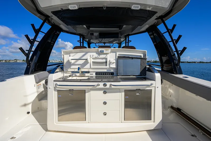 Slide: The Image of 2024 Boston Whaler 42 OUTRAGE boat interior with modern amenities and ocean view. - 36