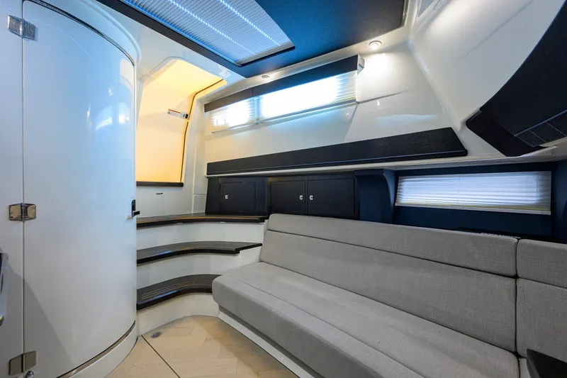 Slide: The Image of Luxurious interior of 2024 Boston Whaler 42 OUTRAGE with modern seating and sleek design. - 21