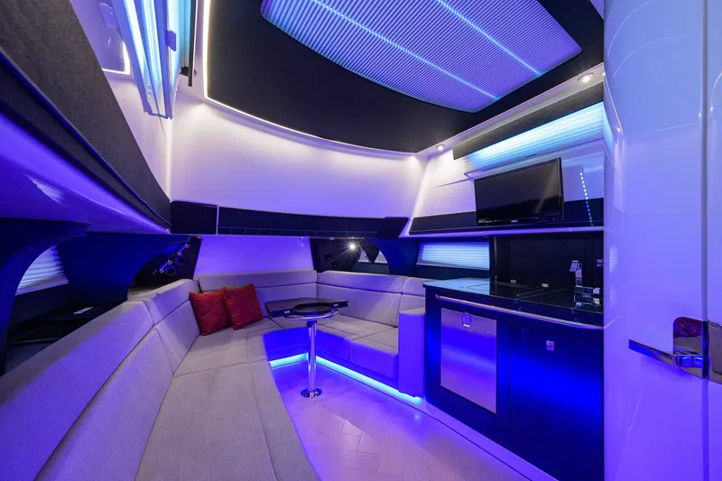 Slide: The Image of Luxurious interior of 2024 Boston Whaler 42 OUTRAGE with modern lighting and sleek design. - 18