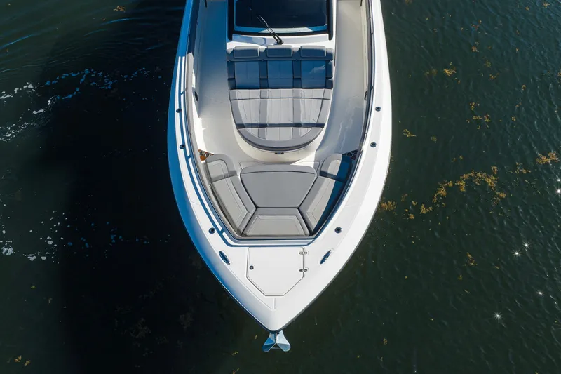 Slide: The Image of Aerial view of 2024 Boston Whaler 42 OUTRAGE boat on water. - 2