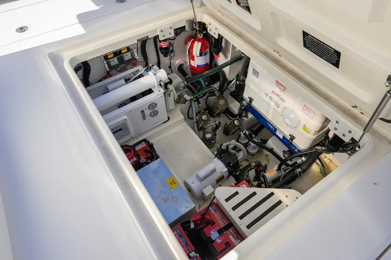 Slide: The Image of Engine compartment of 2024 Boston Whaler 42 OUTRAGE, showcasing advanced marine equipment and systems. - 33