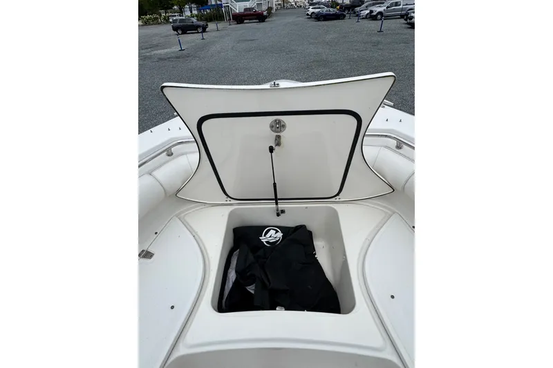 Slide: The Image of Open storage compartment on 2005 Boston Whaler Outrage 320 boat deck. - 8