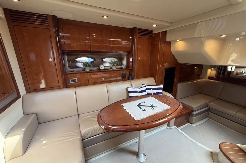 Slide: The Image of Luxurious interior of 2004 Sea Ray 390 Sundancer yacht with elegant wood finishes. - 28