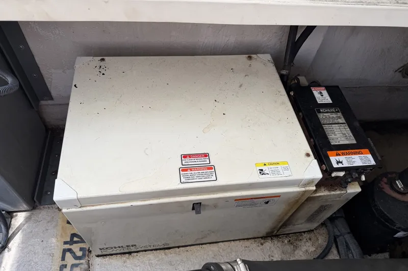 Slide: The Image of Kohler generator in a 2004 Sea Ray 390 Sundancer boat engine compartment. - 45