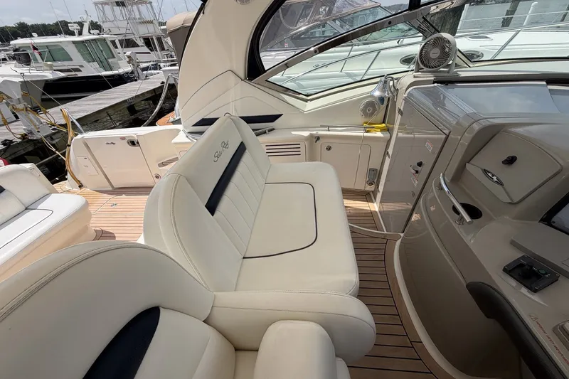 Slide: The Image of Luxurious 2004 Sea Ray 390 Sundancer yacht interior with plush seating and sleek design. - 10