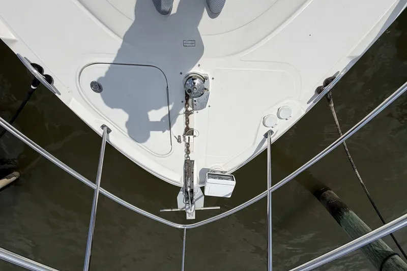 Slide: The Image of Bow view of 2004 Sea Ray 390 Sundancer yacht with anchor and railing. - 24