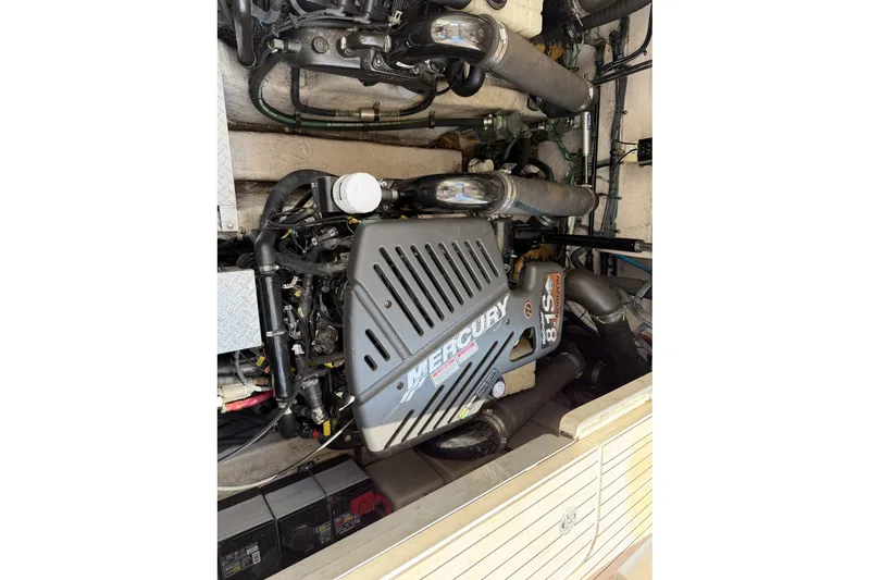 Slide: The Image of Engine compartment of a 2004 Sea Ray 390 Sundancer with Mercury 8.1S motor. - 43