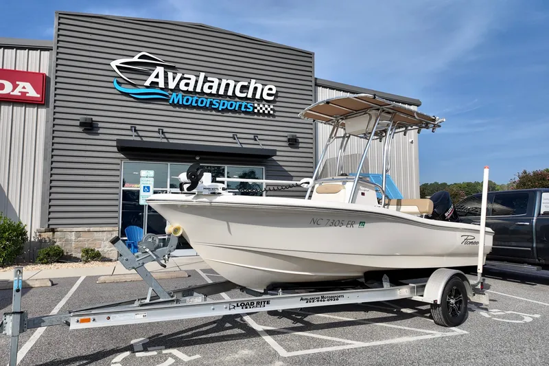 The Image of 2020 Pioneer 180 Sportfish boat on trailer at Avalanche Motorsports dealership. - 0