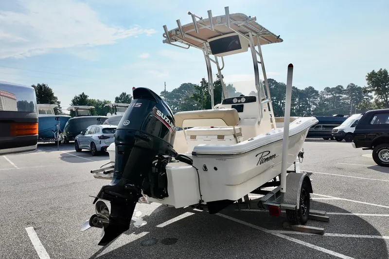Slide: The Image of 2020 Pioneer 180 Sportfish boat with Suzuki engine on trailer in parking lot. - 3