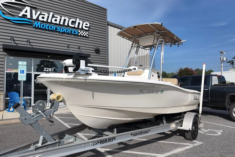 Slide: The Image of 2020 Pioneer 180 Sportfish boat on trailer at Avalanche Motorsports dealership. - 1