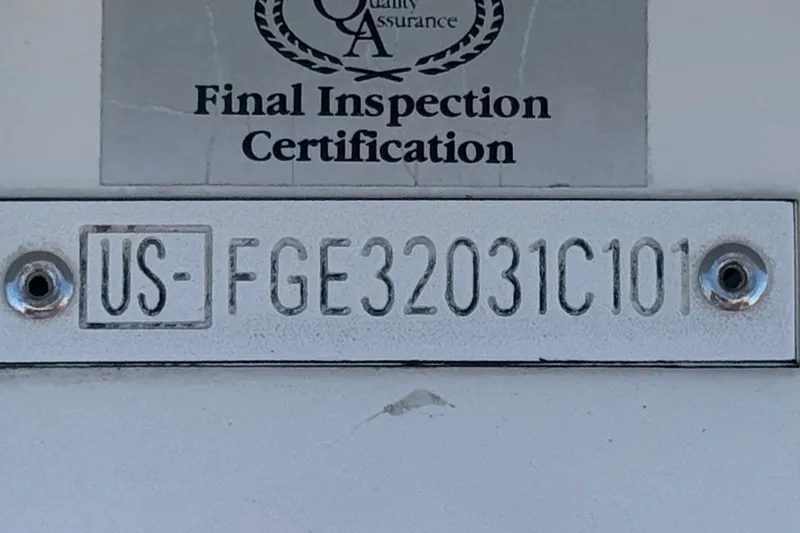 Slide: The Image of 2001 Cobalt 232 final inspection certification with serial number US-FGE32031C101. - 35