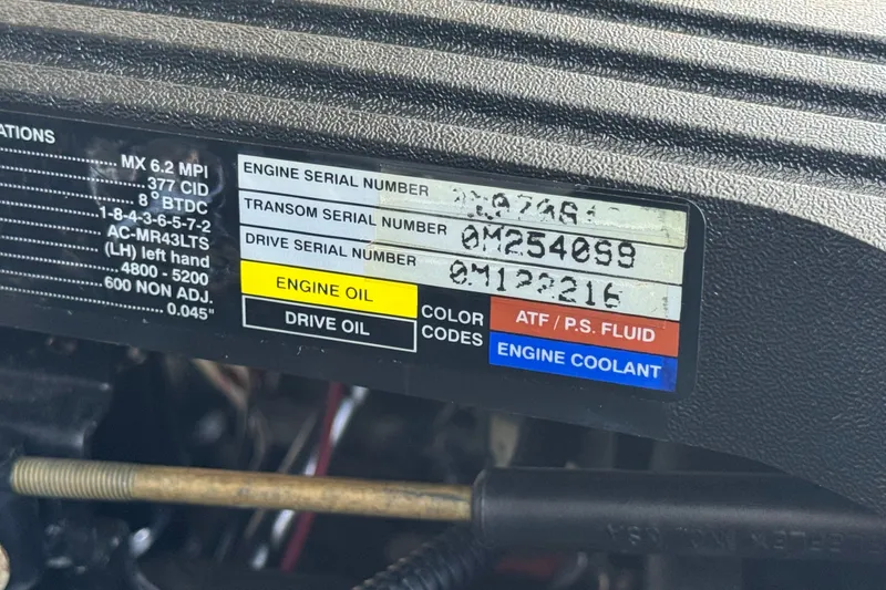 Slide: The Image of Label displaying engine, transom, and drive serial numbers for a 2001 Cobalt 232. - 22