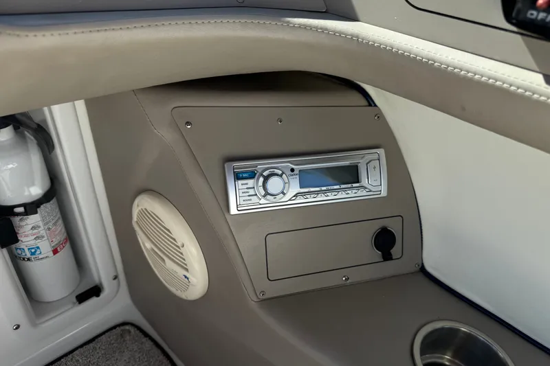 Slide: The Image of 2001 Cobalt 232 boat interior with stereo system and speaker. - 31