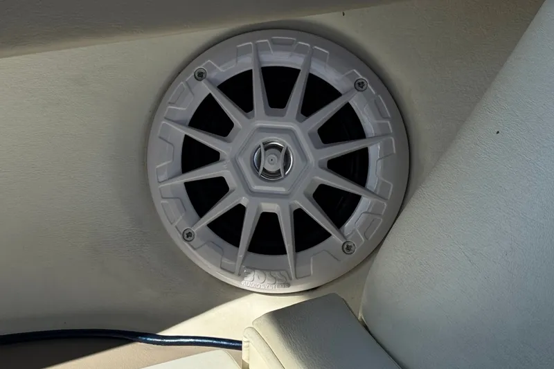 Slide: The Image of Boat speaker in a 2001 Cobalt 232, featuring a white grille design. - 24