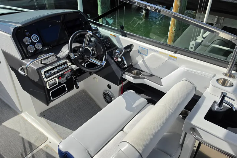 Slide: The Image of 2023 Formula 290 Bowrider cockpit with modern controls and luxurious seating. - 21