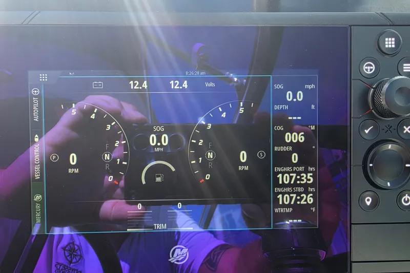 Slide: The Image of Dashboard display of a 2023 Formula 290 Bowrider boat with navigation controls. - 23