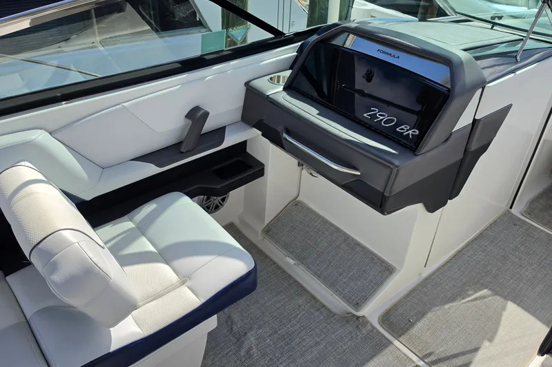 Slide: The Image of 2023 Formula 290 Bowrider interior with modern dashboard and seating. - 24