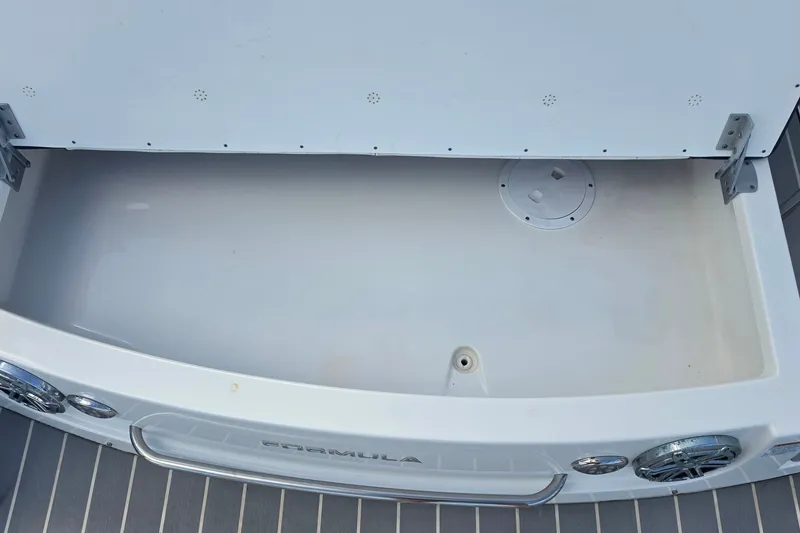 Slide: The Image of Open storage compartment on 2023 Formula 290 Bowrider boat. - 48