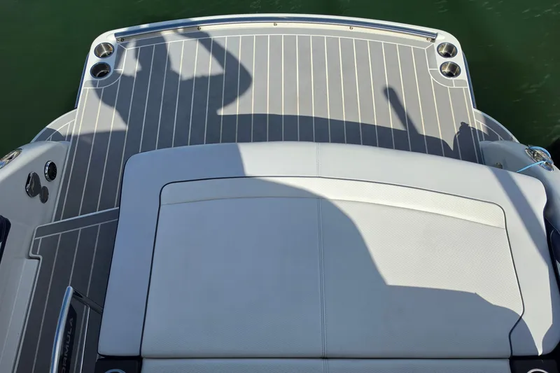 Slide: The Image of 2023 Formula 290 Bowrider boat deck with sleek design and cup holders. - 31