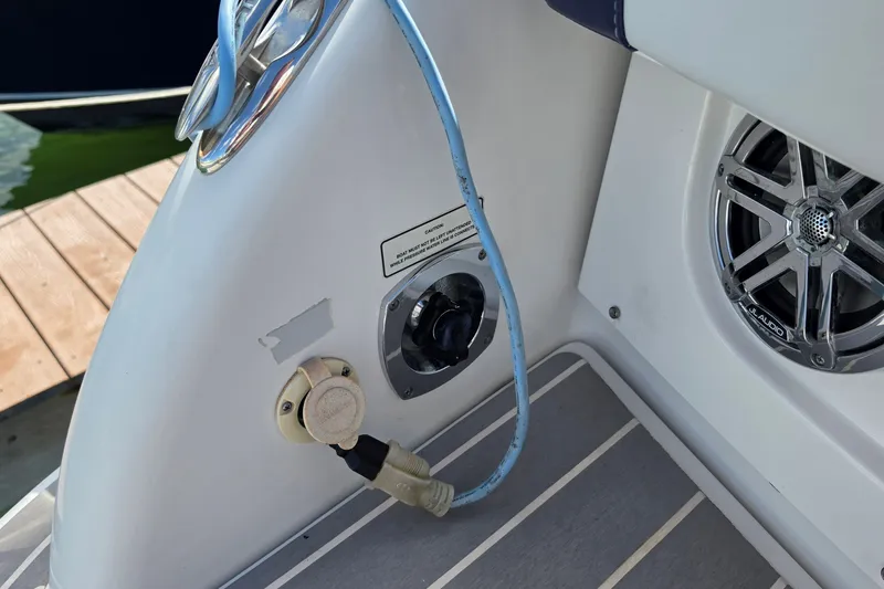 Slide: The Image of 2023 Formula 290 Bowrider boat with speaker and power connections on deck. - 43