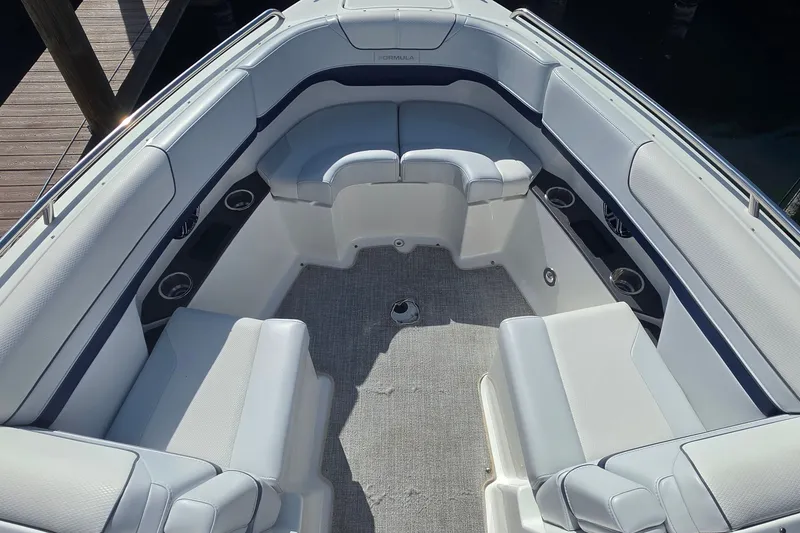 Slide: The Image of 2023 Formula 290 Bowrider interior with spacious seating and modern design. - 14