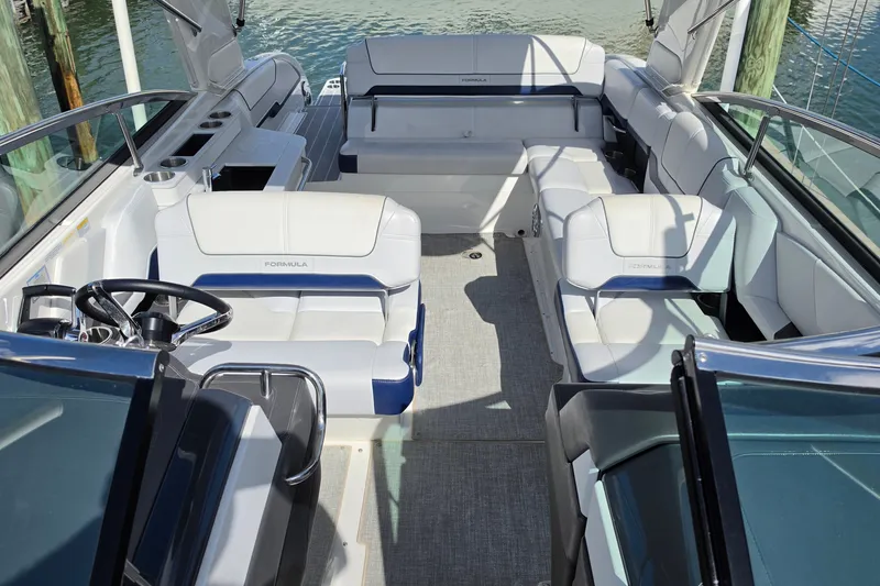 Slide: The Image of 2023 Formula 290 Bowrider interior with luxurious seating and sleek design. - 18