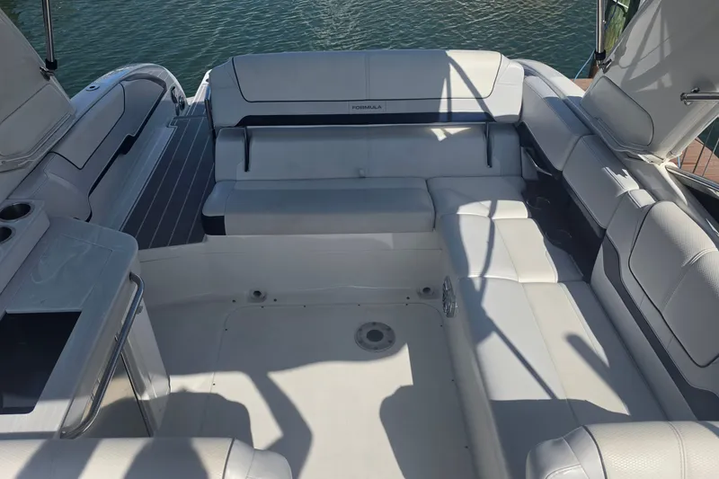 Slide: The Image of 2023 Formula 290 Bowrider boat interior with spacious seating and sleek design. - 30