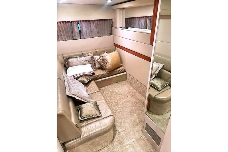 Slide: The Image of Luxurious interior of a 2006 Formula 48 Yacht with plush seating and elegant decor. - 68