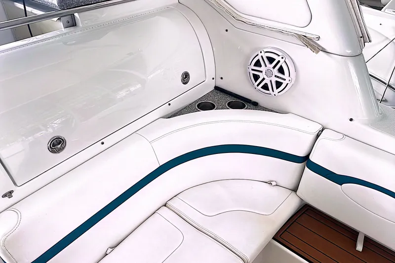 Slide: The Image of Luxurious seating area on a 2006 Formula 48 Yacht with white upholstery and speaker system. - 20