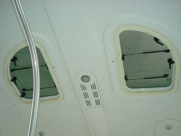 Slide: The Image of Two ceiling hatches with lever locks in a boat. - 32