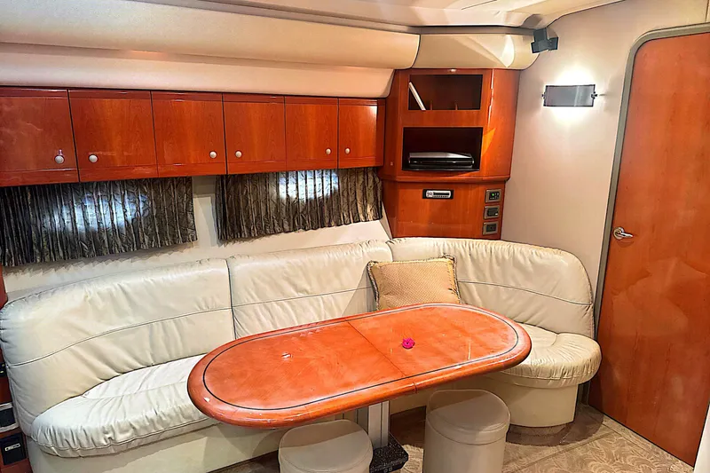 Slide: The Image of Interior of 2006 Formula 48 Yacht with leather seating and wooden cabinetry. - 73
