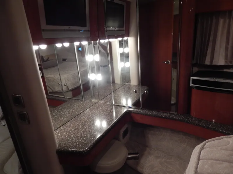 Slide: The Image of 2006 Formula 48 Yacht: Luxurious interior with a lighted vanity and modern amenities. - 48