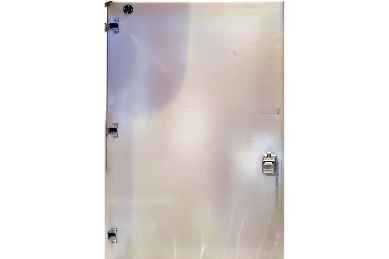 Slide: The Image of Metallic door with latches, part of a 2006 Formula 48 Yacht. - 70