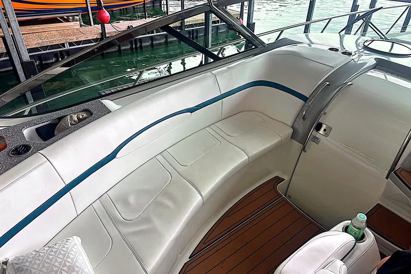 Slide: The Image of Luxurious interior of a 2006 Formula 48 Yacht with white seating and wood flooring. - 19