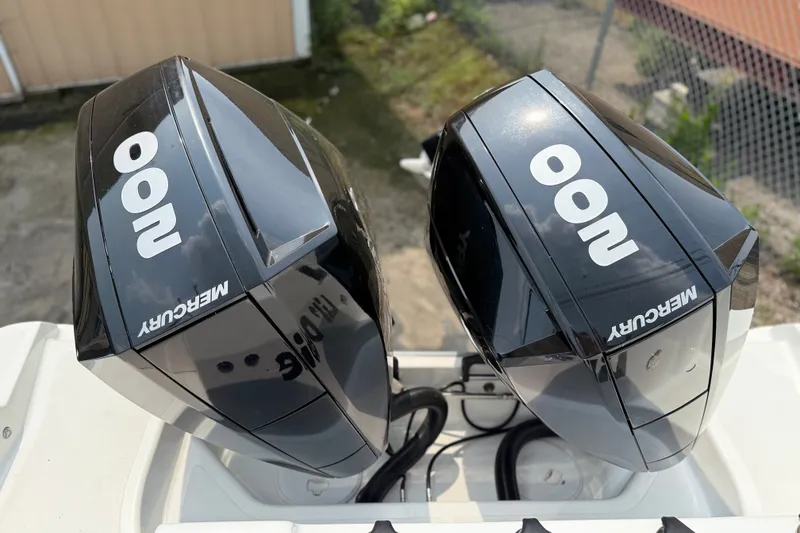 Slide: The Image of Twin Mercury 200 engines on a 2022 Wellcraft 262 Fisherman boat. - 33
